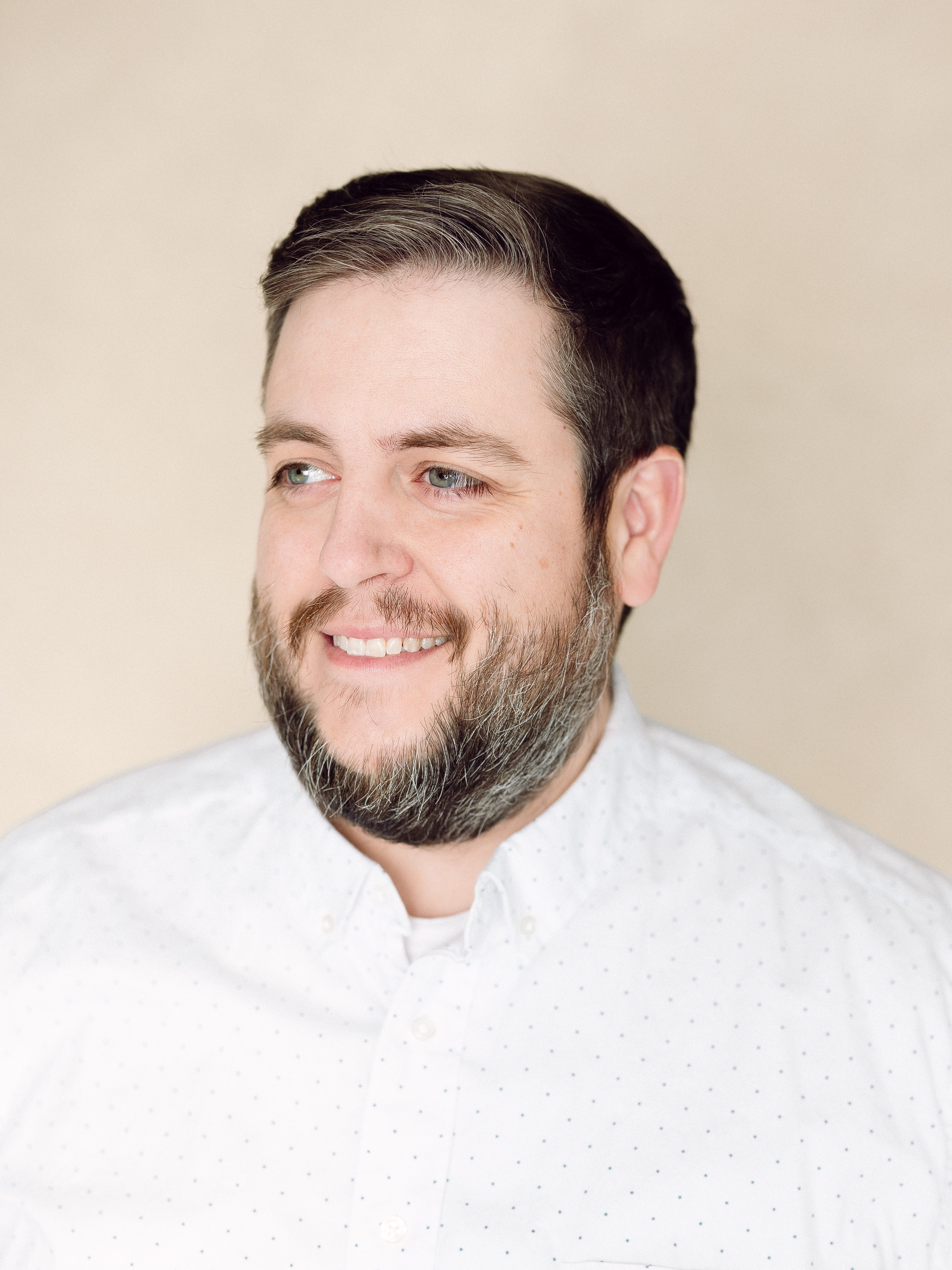 Brian Barnes looking to off camera.